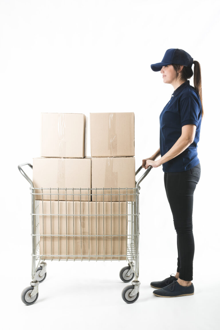 courier pushing hand truck with stack boxes